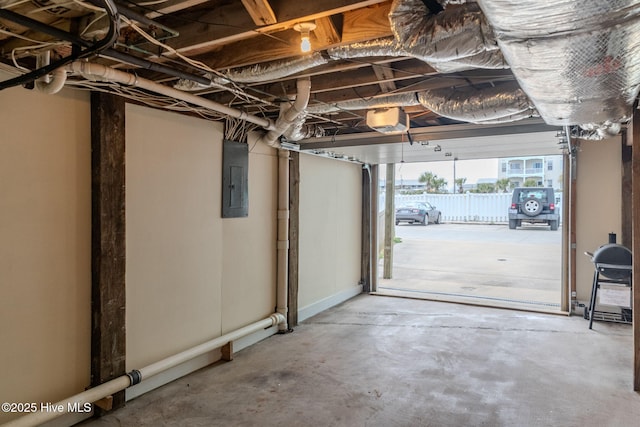 107 Carolina Beach Ave S, Carolina Beach, NC 28428 - garage featuring electric panel and a garage door opener