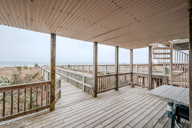 107 Carolina Beach Ave S, Carolina Beach, NC 28428 - wooden terrace featuring stairs, a view of the beach, and a water view