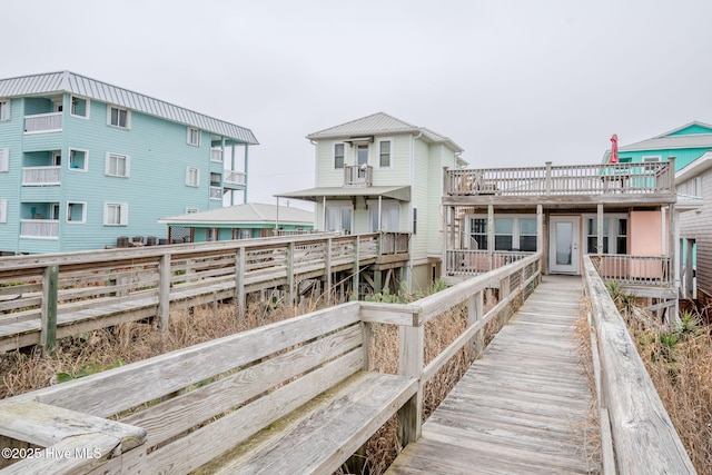 107 Carolina Beach Ave S, Carolina Beach, NC 28428 - rear view of house featuring fence