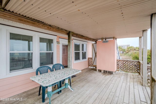 107 Carolina Beach Ave S, Carolina Beach, NC 28428 - wooden deck with outdoor dining space