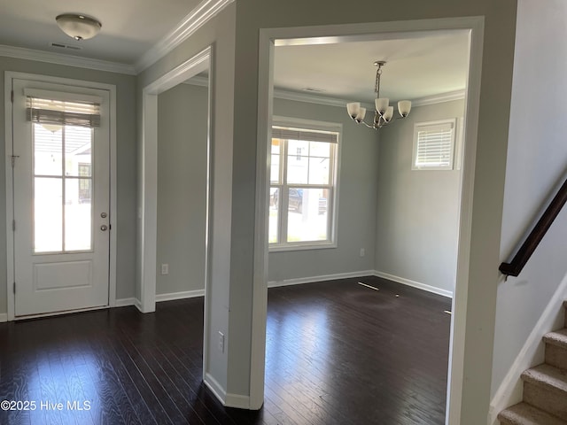 foyer featuring stairway, visible vents, dark wood-style floors, and a notable chandelier