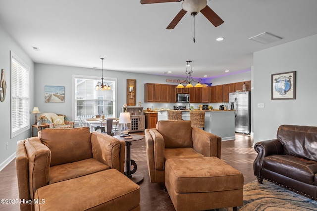 1203 Strange Ct, Morehead City, NC 28557 - living room with dark wood-type flooring, a chandelier, recessed lighting, ceiling fan, and baseboards