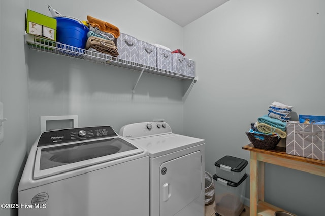 1203 Strange Ct, Morehead City, NC 28557 - clothes washing area featuring washer and dryer and baseboards