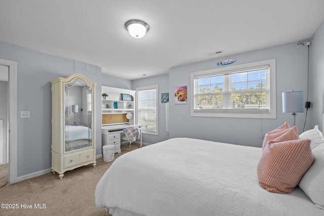 1203 Strange Ct, Morehead City, NC 28557 - carpeted bedroom with baseboards