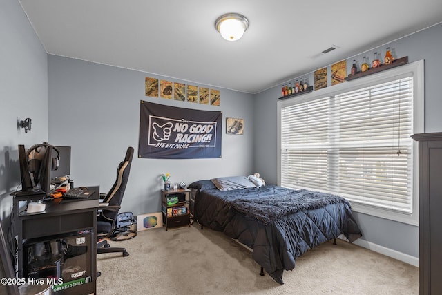 1203 Strange Ct, Morehead City, NC 28557 - carpeted bedroom featuring an office area and baseboards