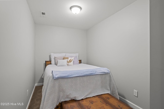 1203 Strange Ct, Morehead City, NC 28557 - bedroom featuring baseboards and wood finished floors