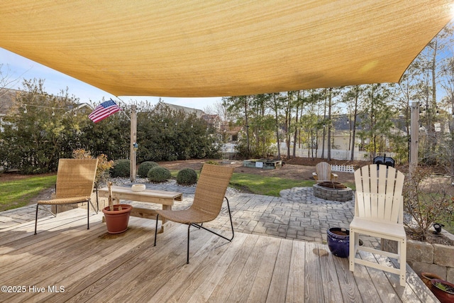 1203 Strange Ct, Morehead City, NC 28557 - wooden terrace featuring an outdoor fire pit and a patio area