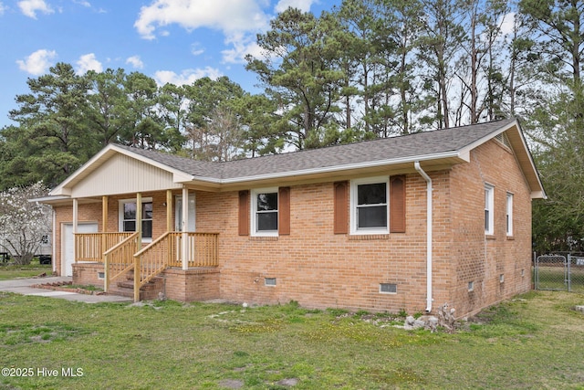 single story home featuring a porch, fence, a front yard, a garage, and brick siding