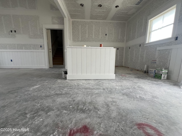 481 N Trotman Rd, Camden, NC 27921 - unfurnished living room featuring unfinished concrete flooring