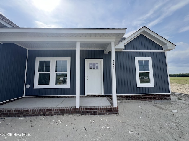 481 N Trotman Rd, Camden, NC 27921 - property entrance with a porch