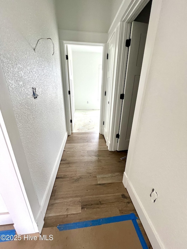 481 N Trotman Rd, Camden, NC 27921 - corridor featuring a textured wall and wood finished floors