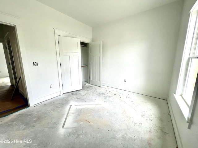 481 N Trotman Rd, Camden, NC 27921 - unfurnished bedroom featuring concrete flooring