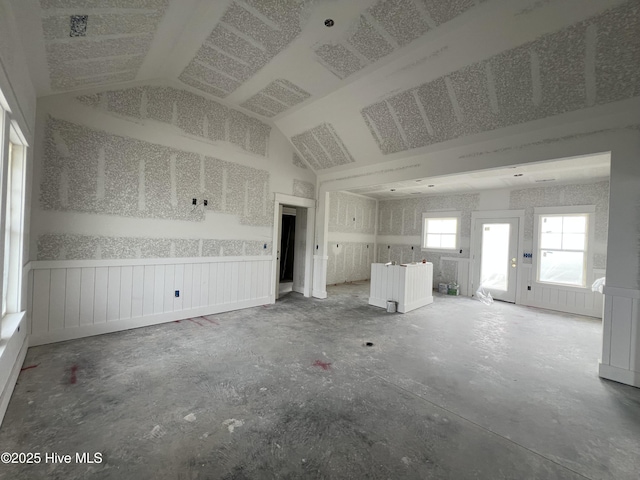 481 N Trotman Rd, Camden, NC 27921 - unfurnished living room with vaulted ceiling and wainscoting