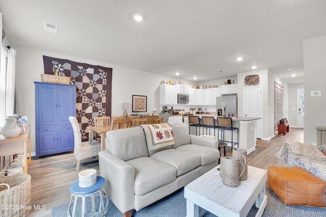 3659 Roseblossom Dr, Leland, NC 28451 - living room with recessed lighting, visible vents, light wood finished floors, and baseboards