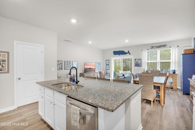 3659 Roseblossom Dr, Leland, NC 28451 - kitchen with visible vents, open floor plan, dishwasher, light wood-type flooring, and a sink