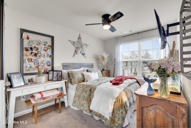 3659 Roseblossom Dr, Leland, NC 28451 - bedroom with visible vents, ceiling fan, and carpet