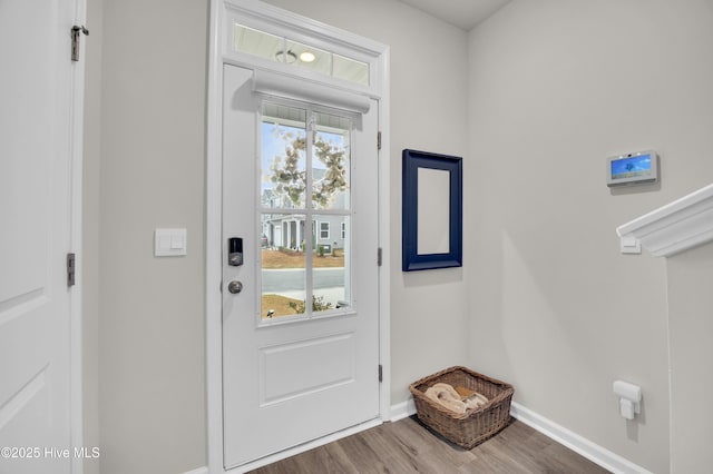 3659 Roseblossom Dr, Leland, NC 28451 - entryway with baseboards and wood finished floors