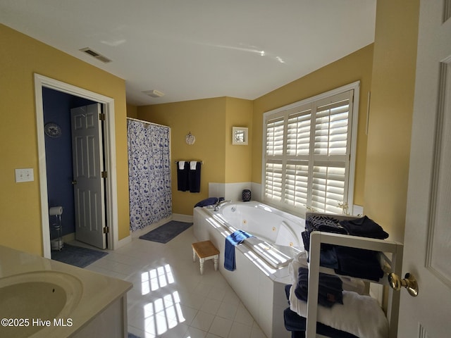 405 Commerce Ave Unit A, Morehead City, NC 28557 - full bathroom featuring vanity, tile patterned floors, a tub with jets, a shower with curtain, and visible vents