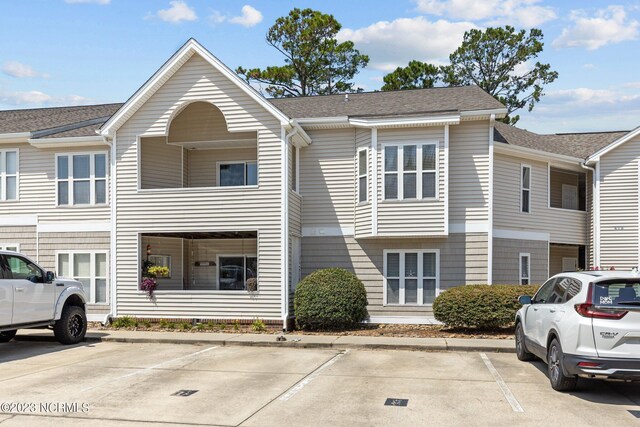 405 Commerce Ave Unit A, Morehead City, NC 28557 - aerial perspective of suburban area featuring a nearby body of water