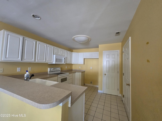405 Commerce Ave Unit A, Morehead City, NC 28557 - bathroom with visible vents, vanity, toilet, tile patterned floors, and shower / bath combination
