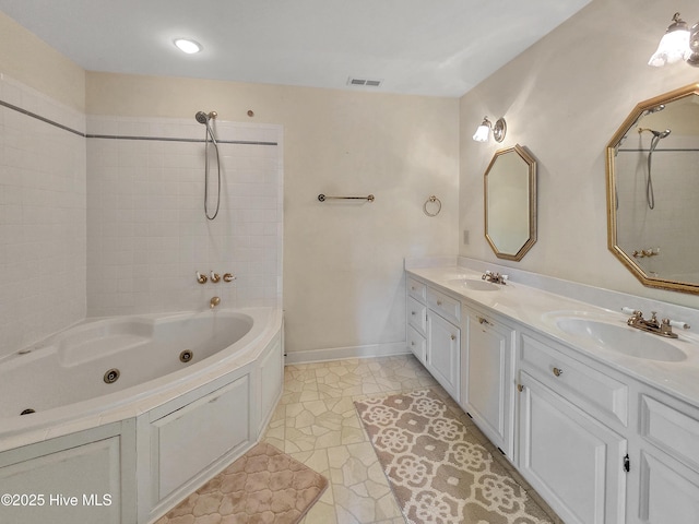 full bathroom featuring baseboards, visible vents, a sink, and double vanity