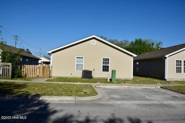 1008 S 10th St, Wilmington, NC 28401 - view of property exterior featuring uncovered parking and cooling unit