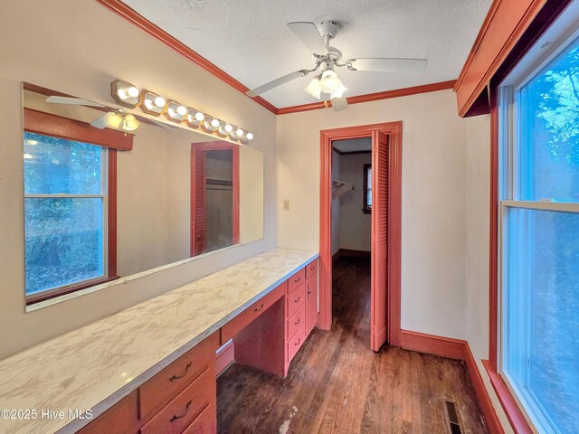 203 Crescent Dr, Windsor, NC 27983 - bathroom featuring a ceiling fan, hardwood / wood-style flooring, ornamental molding, a textured ceiling, and vanity