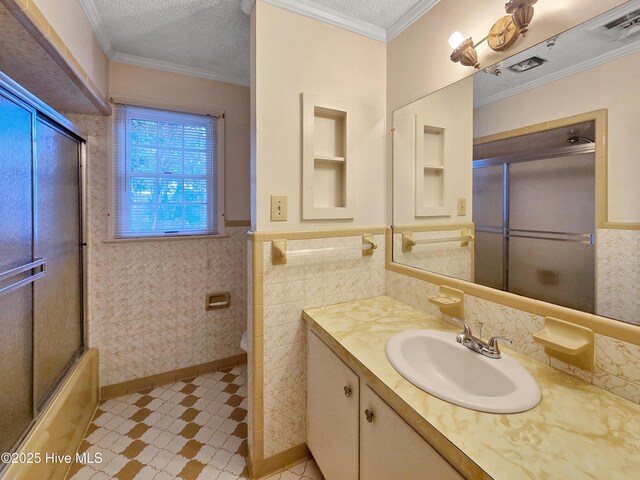 203 Crescent Dr, Windsor, NC 27983 - unfurnished room featuring dark wood finished floors, ornamental molding, a textured ceiling, and baseboards