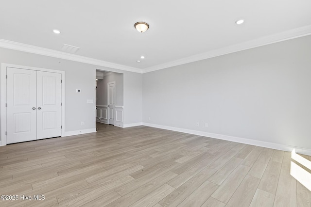 3700 Cessna Way W, Wilson, NC 27896 - unfurnished bedroom with crown molding, light wood-type flooring, baseboards, recessed lighting, and a closet