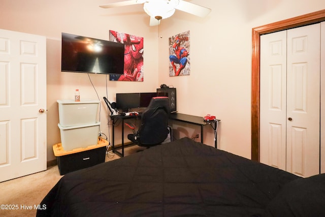 bedroom featuring a closet and carpet