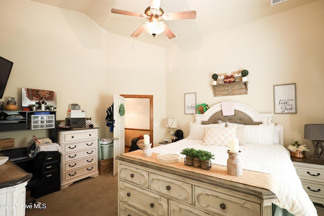 carpeted bedroom featuring vaulted ceiling and ceiling fan