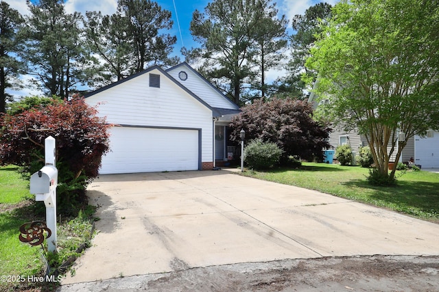 garage featuring driveway