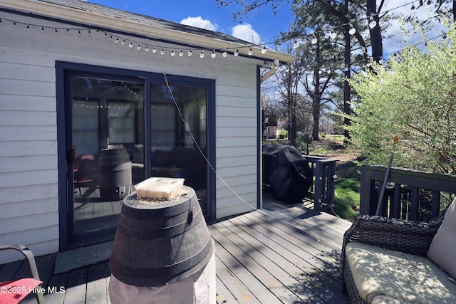 wooden terrace with grilling area