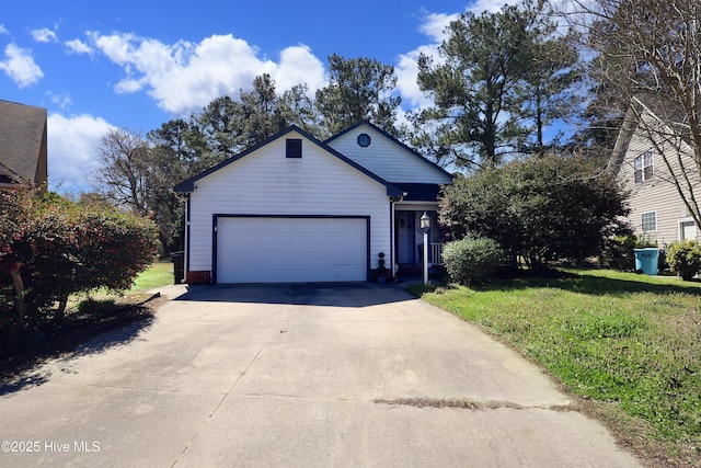 ranch-style home with an attached garage, a front lawn, and concrete driveway