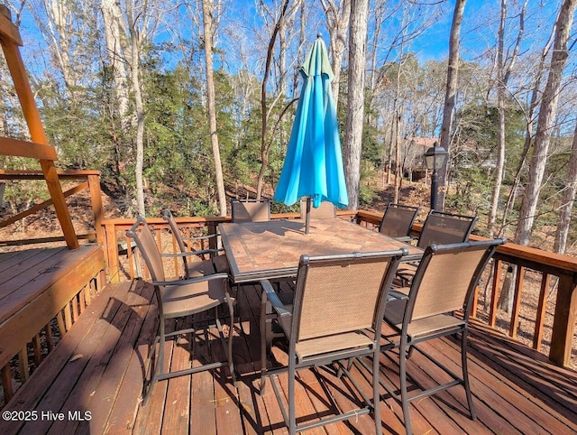 deck featuring outdoor dining space