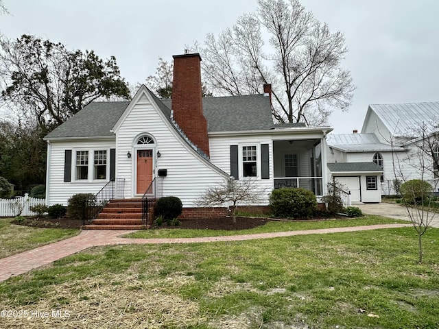 204 N Granville St, Edenton, NC 27932 - bungalow-style house with a shingled roof, a front lawn, fence, and a chimney