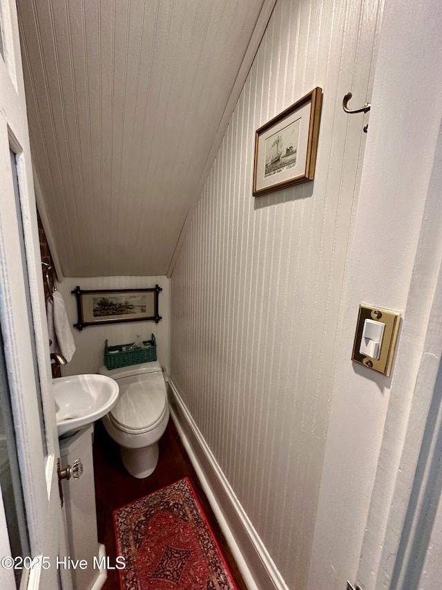 204 N Granville St, Edenton, NC 27932 - bathroom with wood finished floors, toilet, and a sink