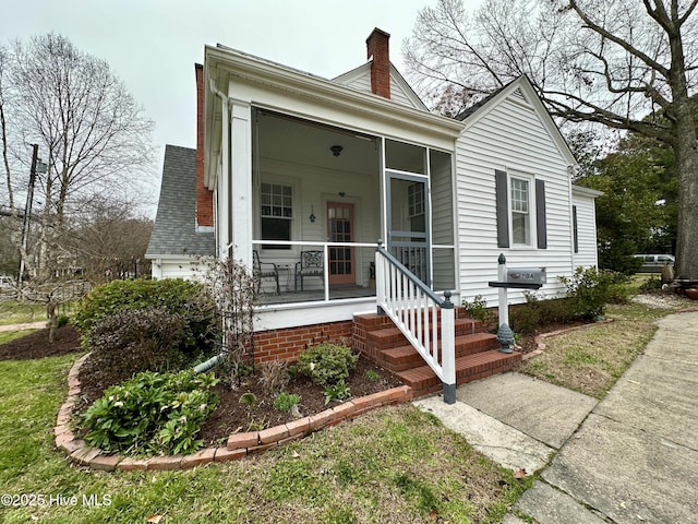 204 N Granville St, Edenton, NC 27932 - bungalow-style house with a porch, a chimney, and a shingled roof