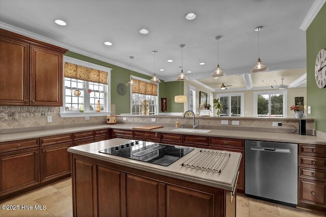 42 Harbour Village Ter, Hampstead, NC 28443 - kitchen with a sink, black electric cooktop, tasteful backsplash, and dishwasher
