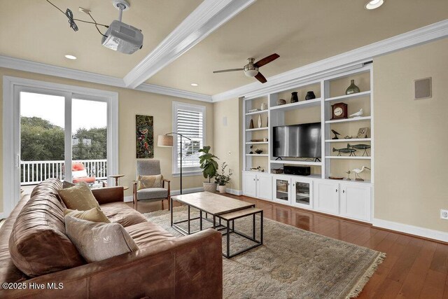42 Harbour Village Ter, Hampstead, NC 28443 - living room with hardwood / wood-style floors, plenty of natural light, ceiling fan, and crown molding