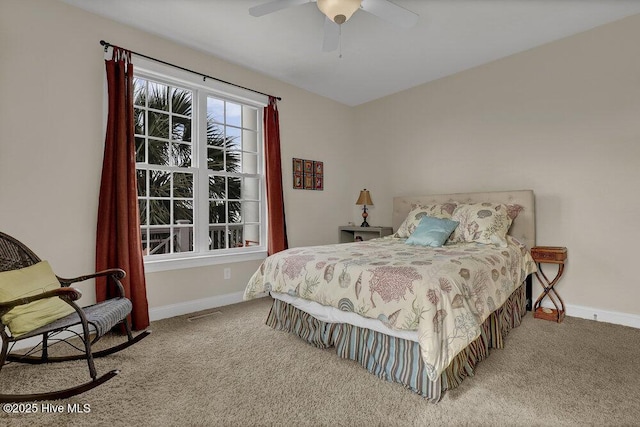 42 Harbour Village Ter, Hampstead, NC 28443 - carpeted bedroom with baseboards and ceiling fan