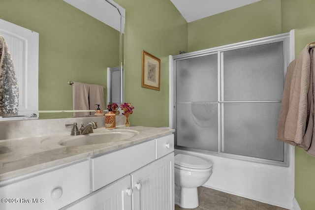 42 Harbour Village Ter, Hampstead, NC 28443 - bathroom featuring enclosed tub / shower combo, toilet, vanity, and tile patterned flooring