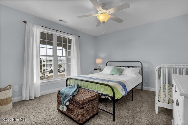42 Harbour Village Ter, Hampstead, NC 28443 - bedroom with a ceiling fan, carpet, visible vents, and baseboards
