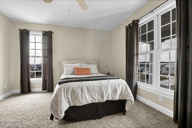 42 Harbour Village Ter, Hampstead, NC 28443 - carpeted bedroom with baseboards and a ceiling fan