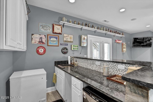 42 Harbour Village Ter, Hampstead, NC 28443 - kitchen with visible vents, white fridge, dishwasher, white cabinets, and a sink
