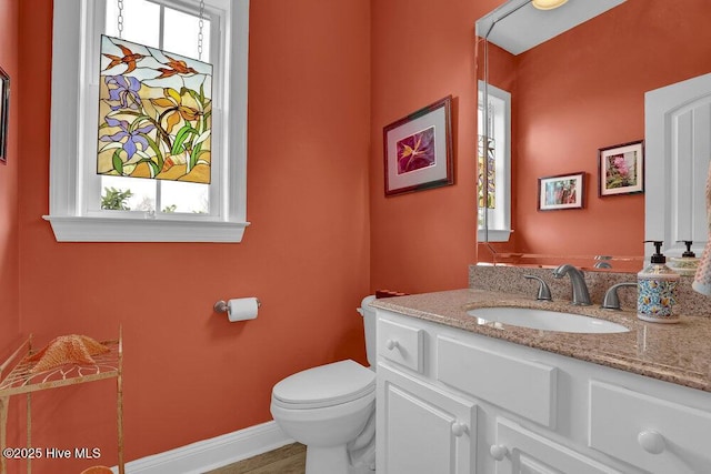 42 Harbour Village Ter, Hampstead, NC 28443 - bathroom featuring baseboards, toilet, and vanity