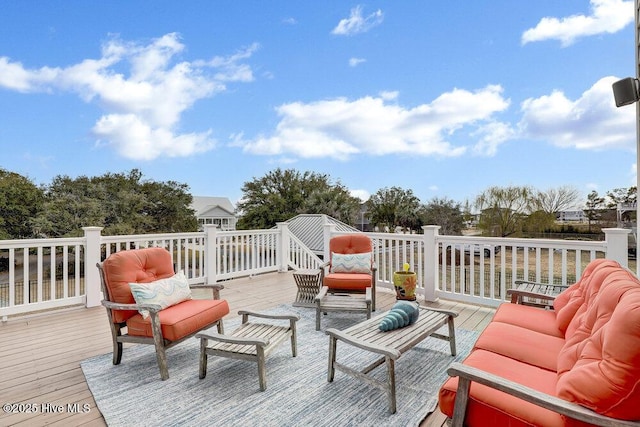 42 Harbour Village Ter, Hampstead, NC 28443 - wooden terrace with an outdoor hangout area