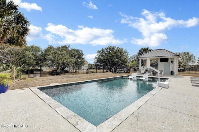 42 Harbour Village Ter, Hampstead, NC 28443 - view of swimming pool featuring a gazebo, a fenced in pool, a patio, and fence