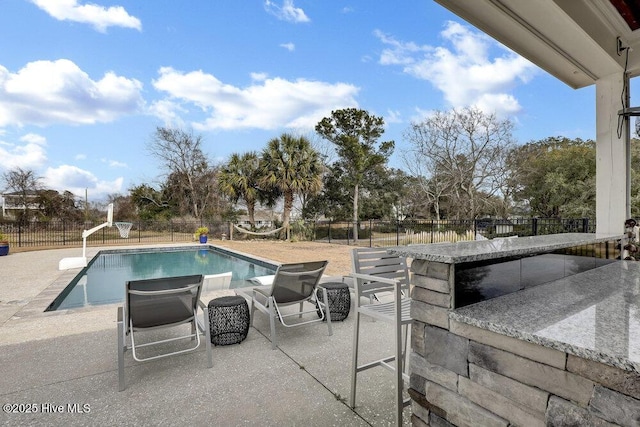 42 Harbour Village Ter, Hampstead, NC 28443 - view of swimming pool with outdoor dry bar, a patio area, fence private yard, and a fenced in pool