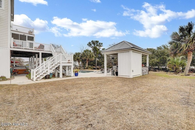 42 Harbour Village Ter, Hampstead, NC 28443 - view of yard with stairs and an outdoor pool